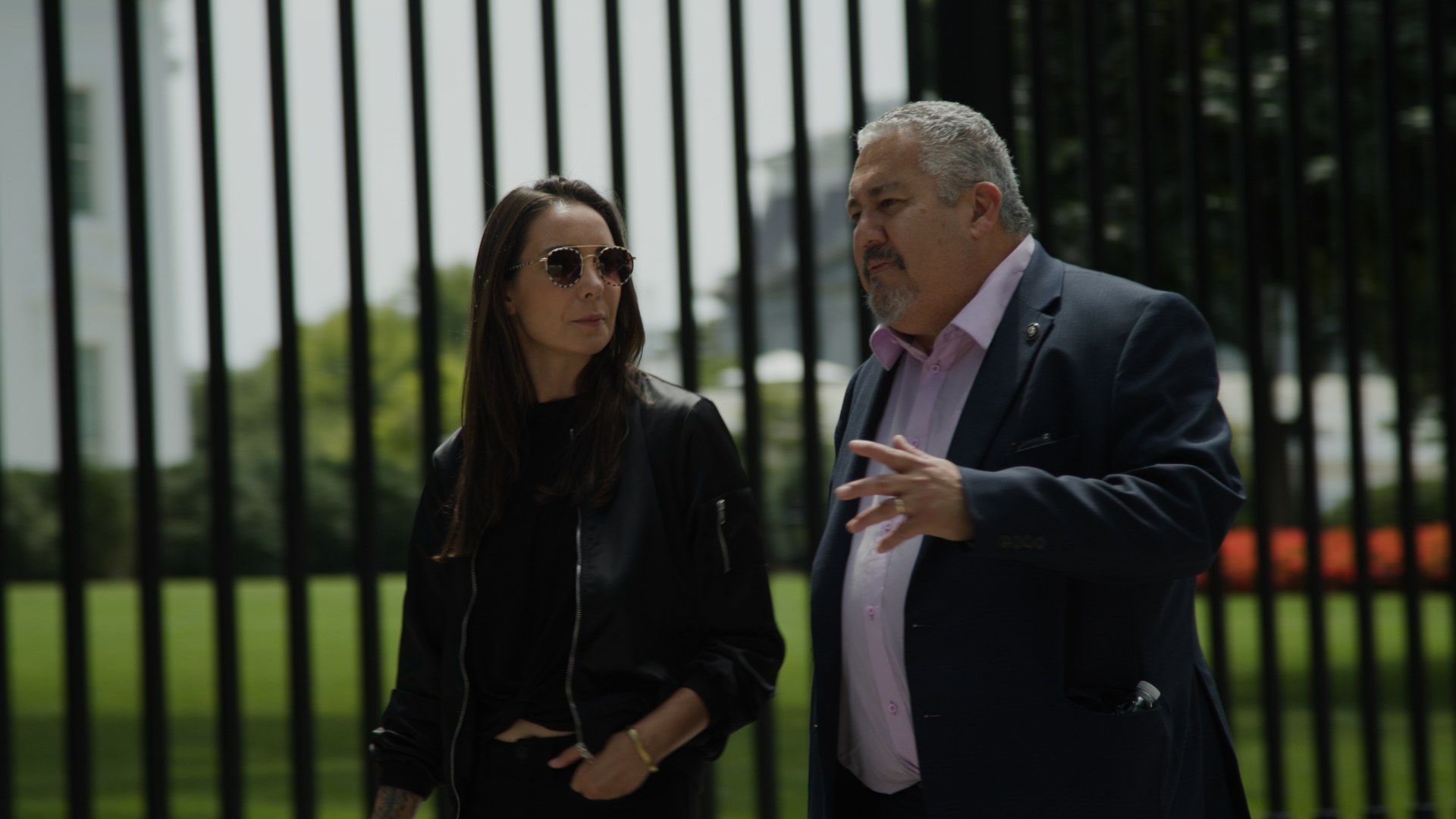 David M. Luna and Sam Rad in conversation outside the White House